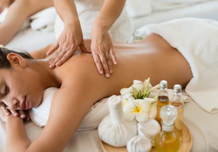 Young beautiful Asian woman relaxing in the Oil spa massage